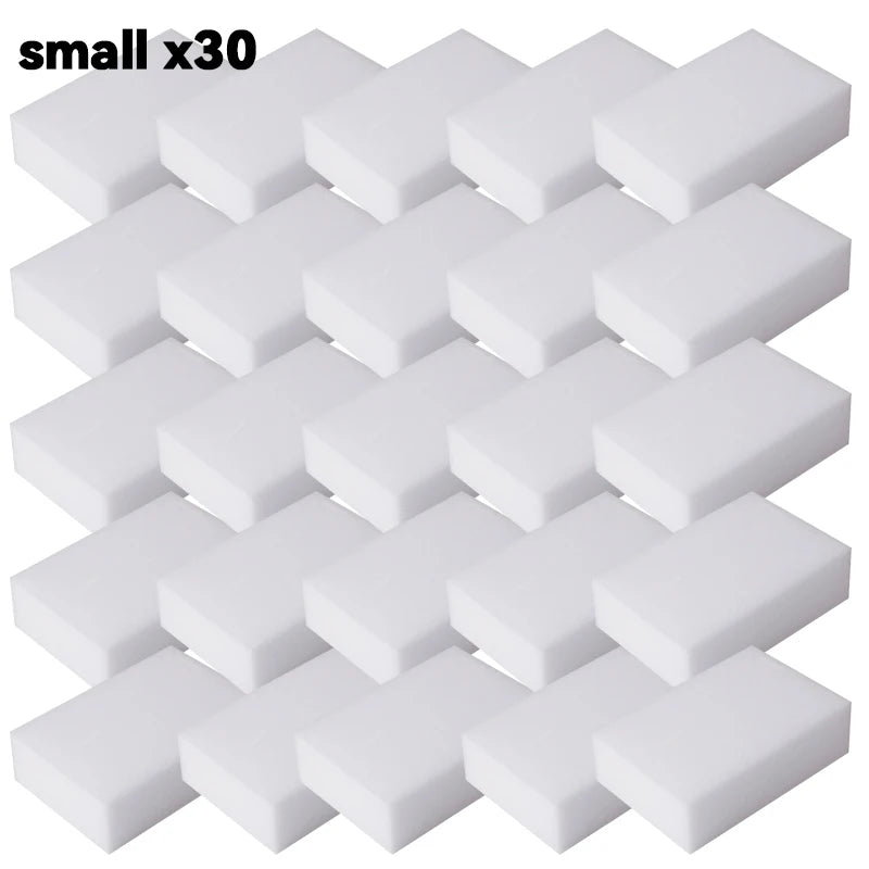 A set of thirty small white melamine sponge cleaning erasers.