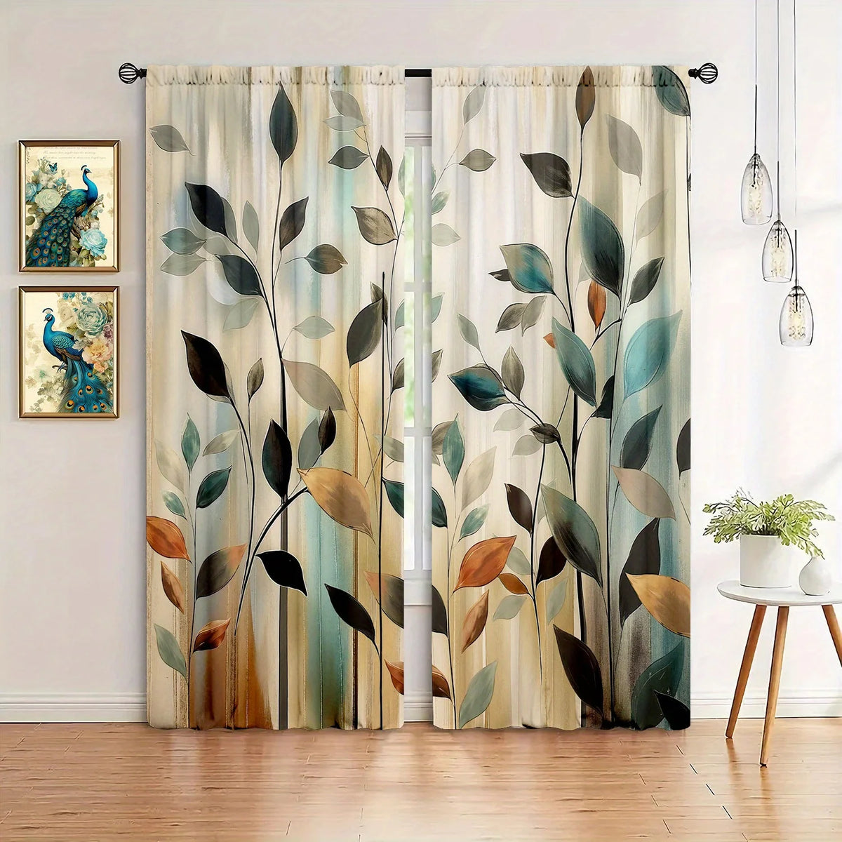 A set of two sheer curtains featuring an abstract leaf print with teal, green, and brown tones.