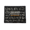 A black plastic tray containing various metal wire puzzle brain teaser tools and components.