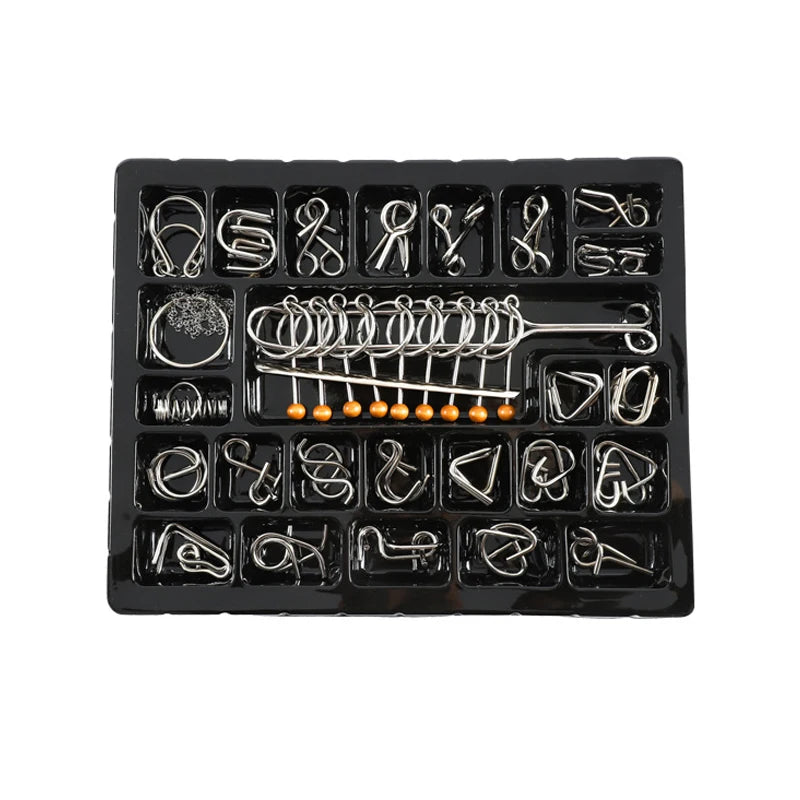 A black plastic tray containing various metal wire puzzle brain teaser tools and components.