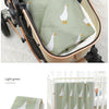 A soft cotton baby swaddle blanket with a white duck cartoon print is shown inside a wooden carrier.