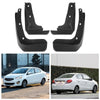 Set of black mud guards for a Mitsubishi Mirage G4 vehicle.