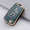 A teal TPU key fob cover with gold accents showing various vehicle keys and a remote control.