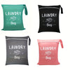 Four colored fabric laundry bags labeled Laundry Bag for travel gym and beach use