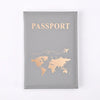 Graues Leder-Passbehörde-Cover mit Goldfolgedruck einer Weltkarte und dem Wort PASSPORT