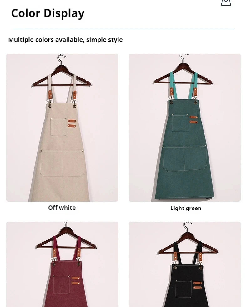 A set of professional chef aprons in off white, light green, maroon, and black colors displayed on hangers.