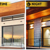 Exterior view of a modern building facade showing the difference between daytime and night lighting.