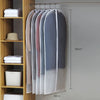 A display of transparent zippered garment bags hanging on a rod, showing various shades of pink and gray.