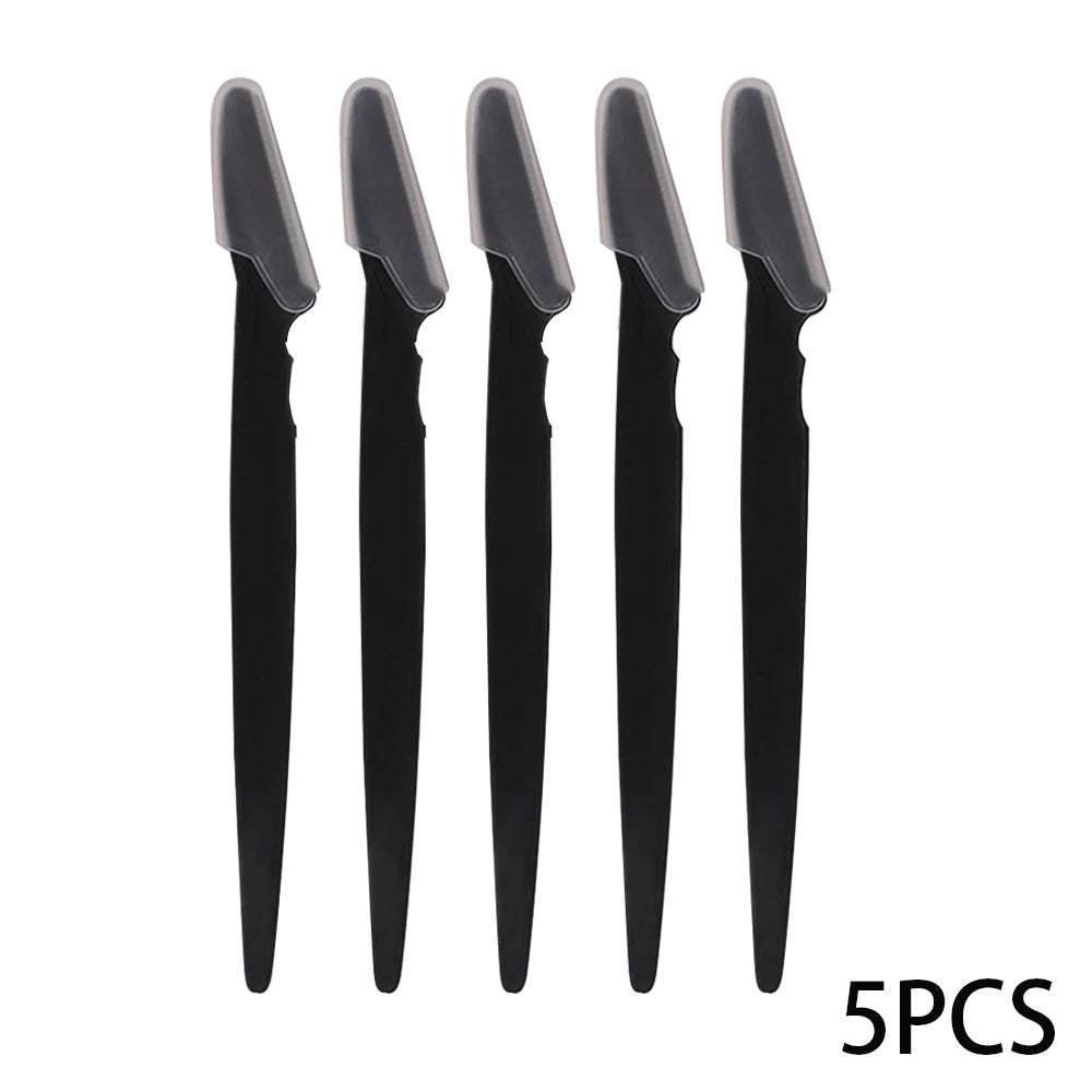 A set of five black precision eyebrow razors for facial grooming and dermaplaning.