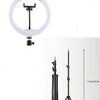 A white ring light and tripod kit with a remote control shown against a white background.