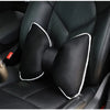 Black silky bow car headrest pillow with waist cushion set shown in a vehicle interior.