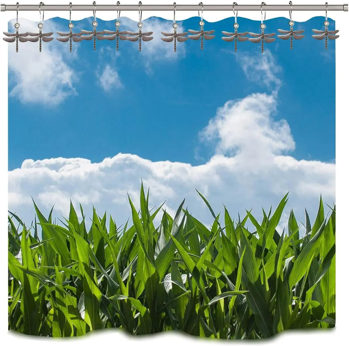 A set of twelve rust-proof metal dragonfly shower curtain hooks hanging against a bright blue sky and clouds above lush green