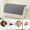 Set of three gray waterproof recliner headrest protector covers shown in use with various labels