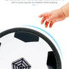 A close-up view of a white soccer ball with black safety edging, demonstrating high-elasticity safety edging.