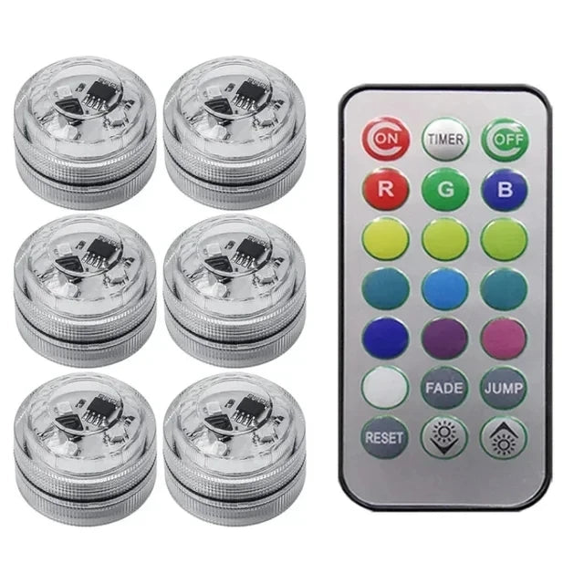 Un jeu d'ampoules argentées et un panneau de commande pour lumières d'ambiance intérieures de voiture RGB sans fil.