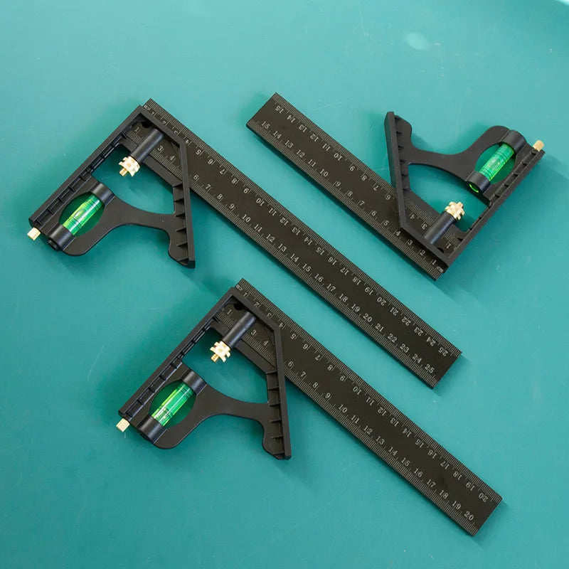 A set of multifunctional carpenter square tools including an angle level and protractor placed on a teal surface.