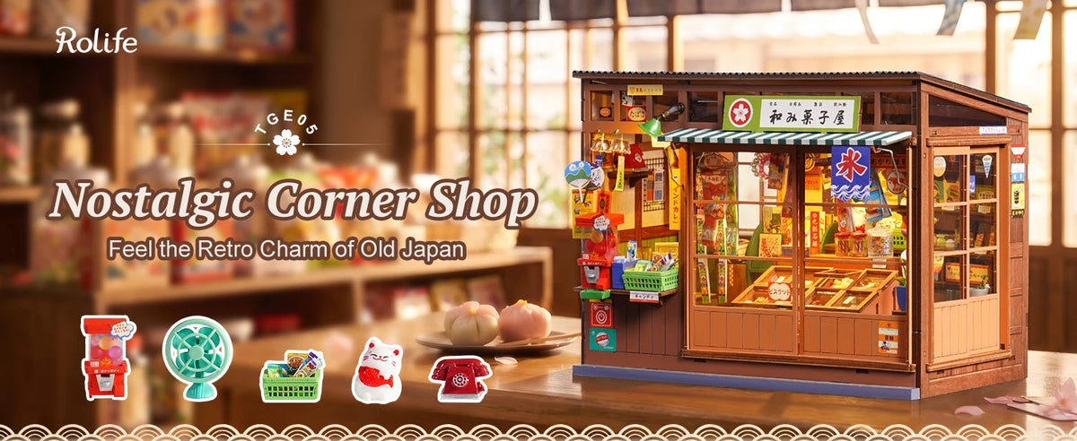 A wooden replica of a vintage Japanese corner shop display with glass windows and colorful items.