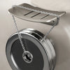 A silver aluminum wall-mounted soap dish with a chain and drain is shown against a light background.