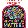 A colorful acrylic nurse badge charms set with a brain design and the text Mental Health Matters