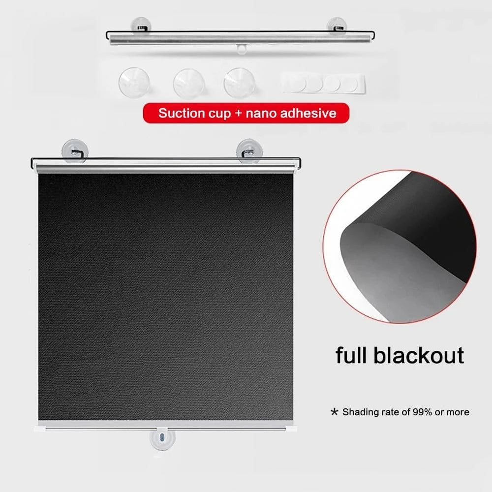 A black cordless retractable roller shade with a silver rod and suction cup hardware, showing a full blackout fabric.