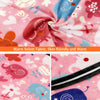 Close-up of pink and blue floral velvet fabric showing various animal patterns for a kids winter balaclava mask