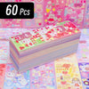 A stack of colorful kawaii stickers for journaling and crafts, featuring various cute designs on pink and pastel backgrounds.