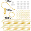 A collection of gold-colored jewelry making components including lobster clasps, jump rings, and crimps.