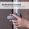 A hand is operating a double button to unlock a door, demonstrating the design for adult use.