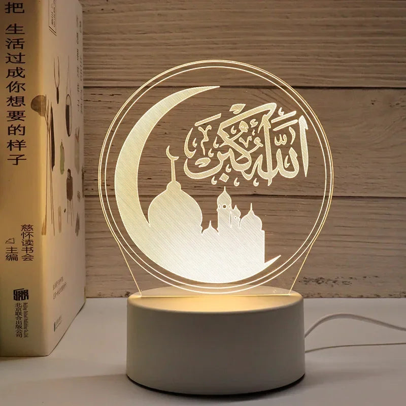 A glowing 3D acrylic LED night light depicting the Arabic phrase Allahu Akbar on a crescent moon against a mosque silhouette.