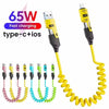A yellow 4-in-1 retractable fast charging cable featuring USB-C and Lightning connectors for 65W power.