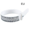 A white adjustable ring and bracelet sizer measuring tool with a strap and markings.