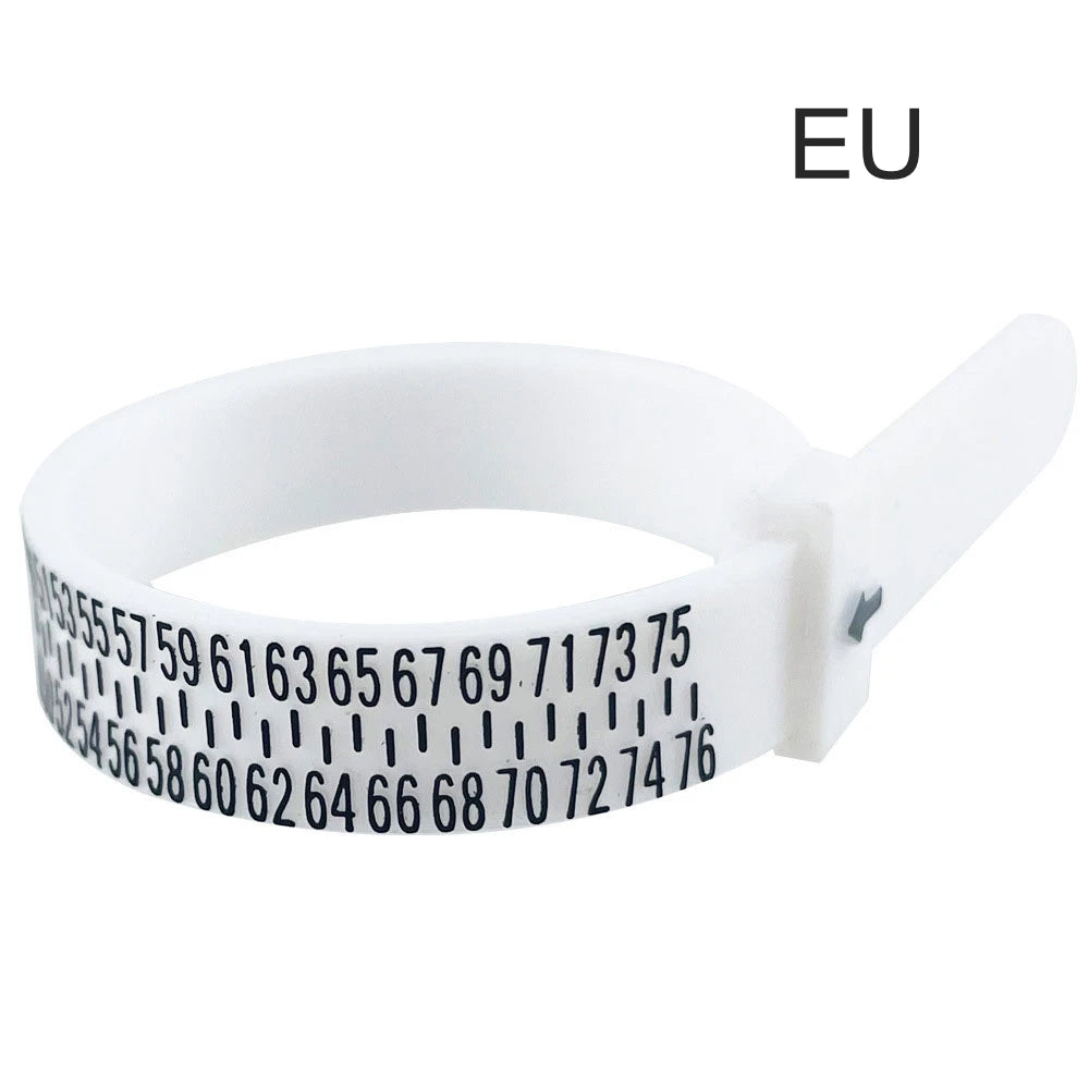 A white adjustable ring and bracelet sizer measuring tool with a strap and markings.