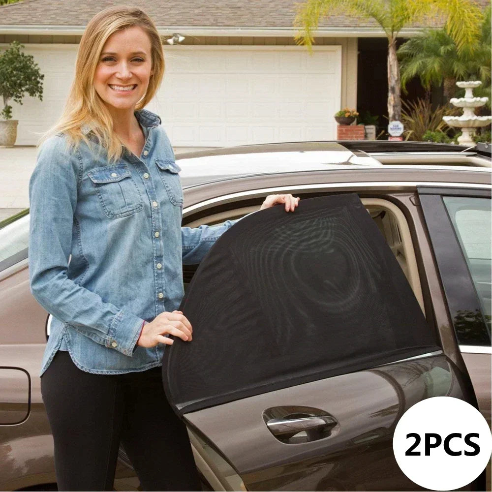 A woman stands next to a car showing a black side window sunshade with mosquito mesh.