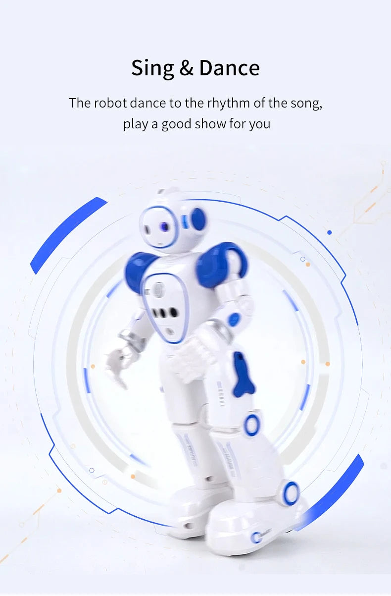 A white and blue interactive dancing robot toy is shown performing a dance motion against a light background.
