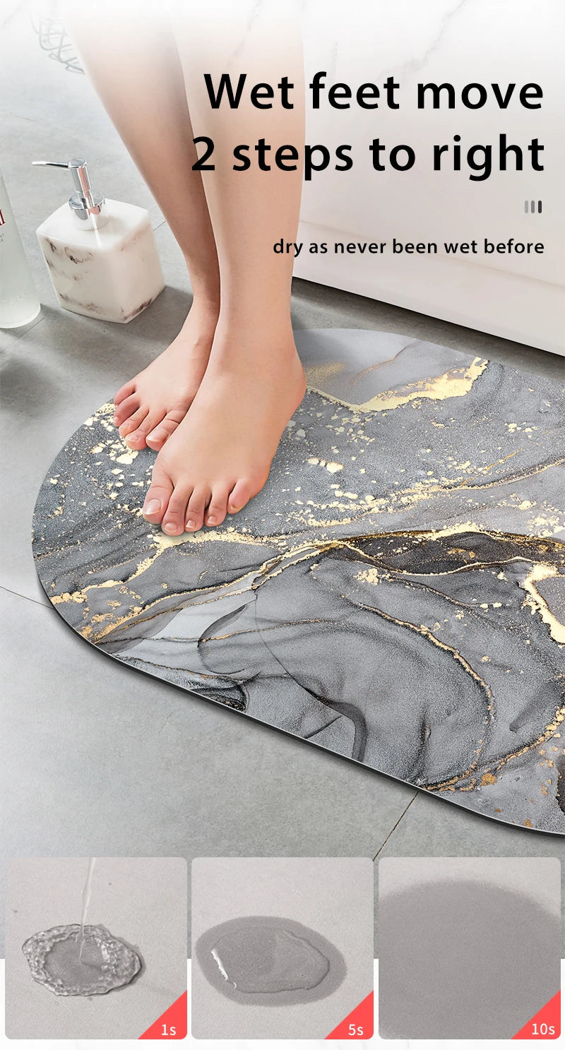 A person's feet are stepping onto a gray and gold non-slip bathroom mat, demonstrating the quick-dry feature.