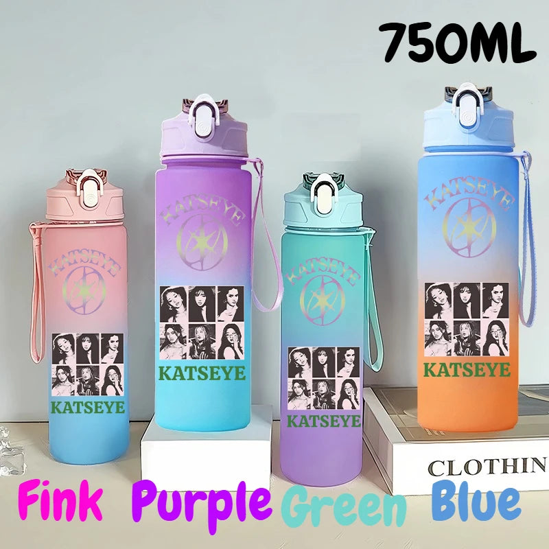 A set of three 750ml portable sports water bottles in pink, purple, and blue colors.