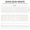 White silicone faucet mat with a sloped design and cuttable sink splash guard