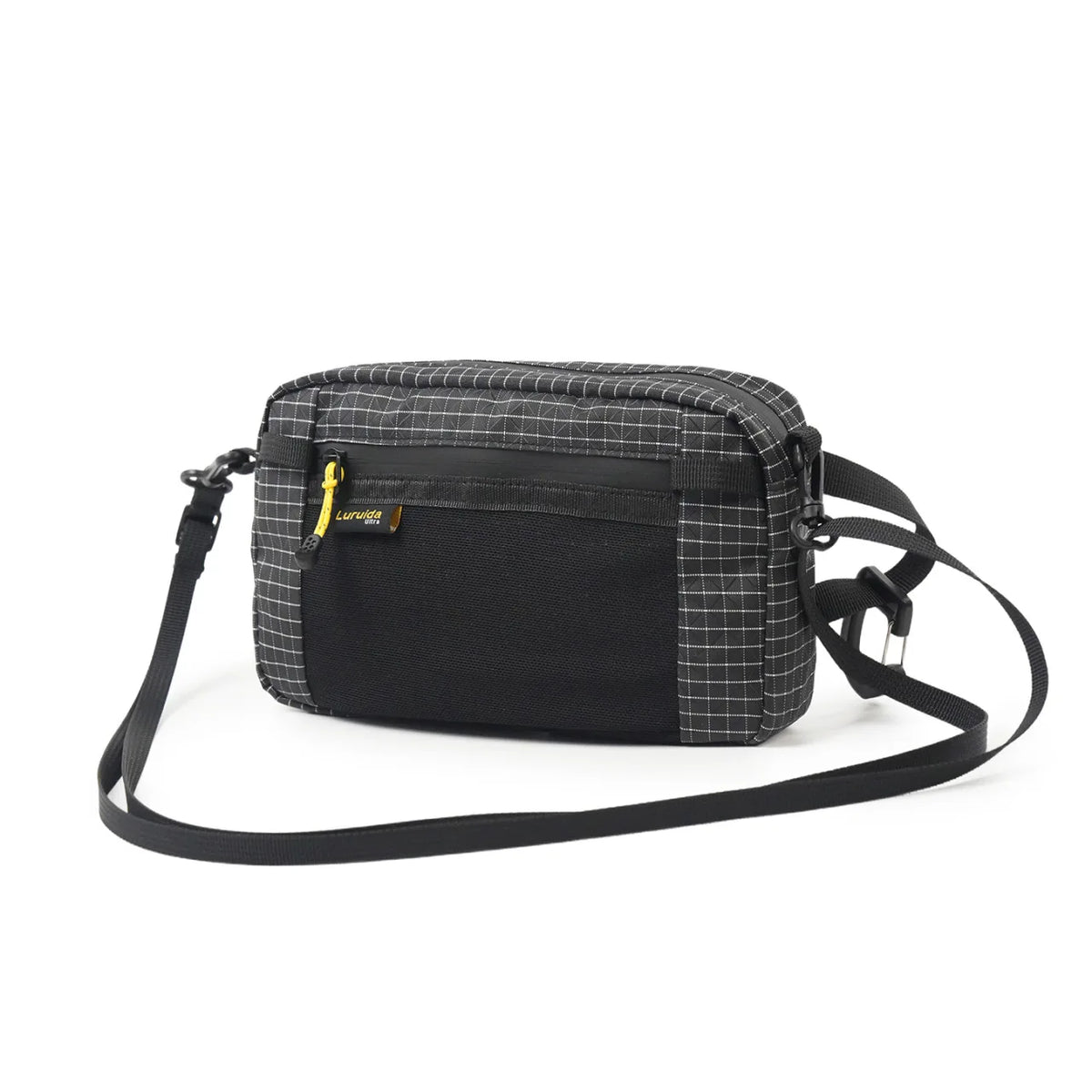 A black and gray plaid waterproof tactical waist bag with black straps.
