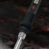 A close-up view of a black soldering iron with an LCD display showing 480°C, set against a dark background.
