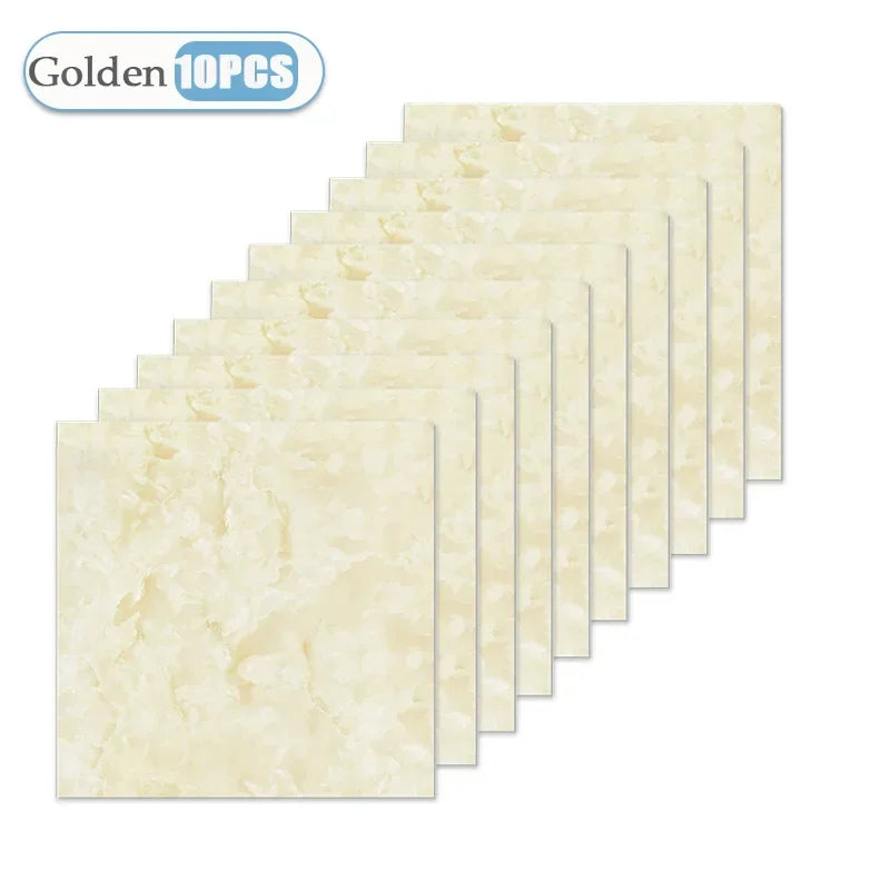 A set of ten gold-colored self-adhesive waterproof tile stickers arranged in a row.