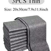 A stack of three thin gray microfiber cleaning cloths, measuring 20x30cm.