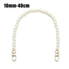 A strand of small, round white pearls on a delicate chain strap.