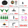 A collection of various irrigation components including hoses, drippers, connectors, and taps for a DIY drip irrigation kit.