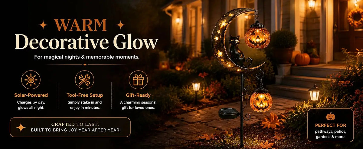 A decorative glow featuring a solar-powered black cat and pumpkin garden stake light illuminating a pathway.