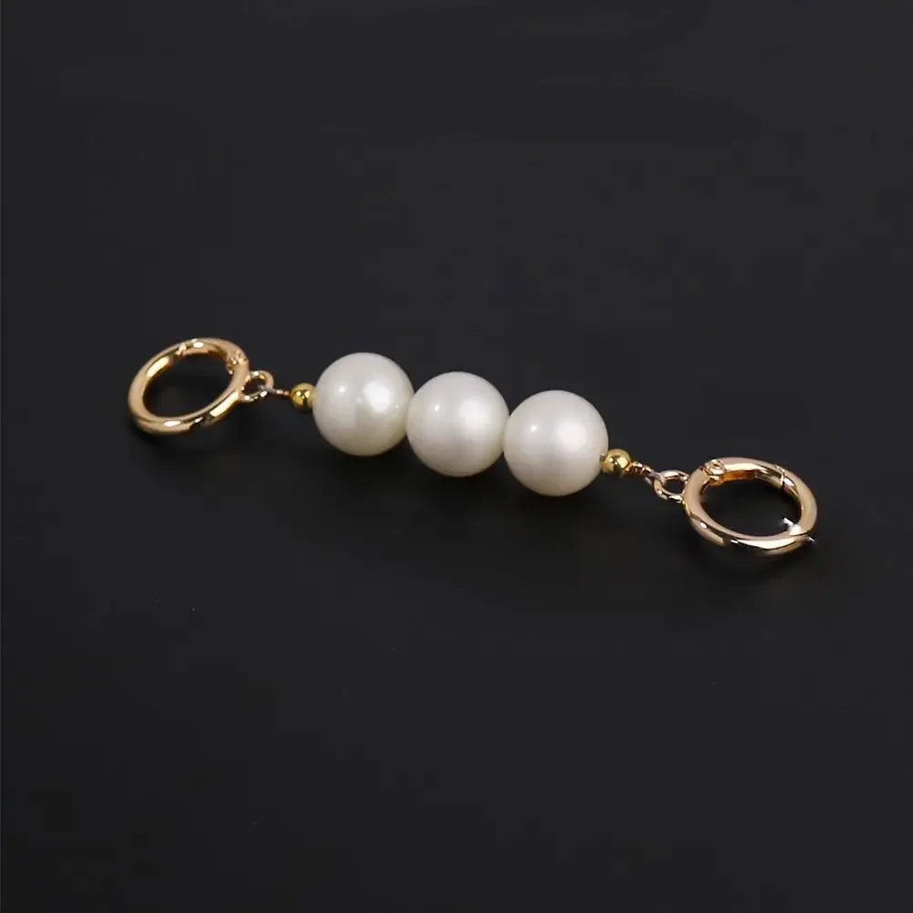 Gold-toned pearl strap replacement featuring five round white pearls.