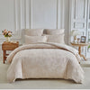 A beige Nordic leaf print duvet cover set displayed on a bed with white molding and natural wood furniture.