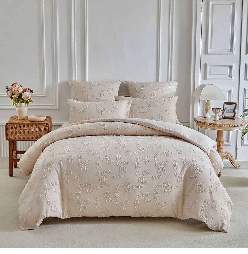 A beige Nordic leaf print duvet cover set displayed on a bed with white molding and natural wood furniture.