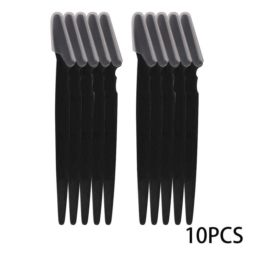 A set of ten black precision eyebrow razors for facial grooming and dermaplaning.