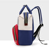 A navy blue and beige insulated canvas diaper bag with a red accent, featuring a hanging hook.