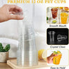 A hand is holding a stack of clear PET plastic cups with lids, demonstrating their smooth mouth and crystal clear appearance.